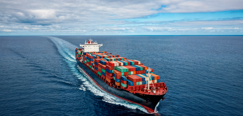 cargo-ship-navigating-ocean.jpg